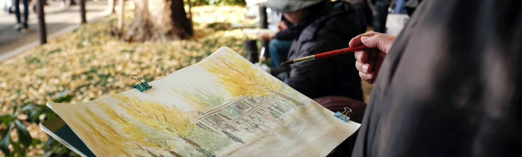 People painting in the park